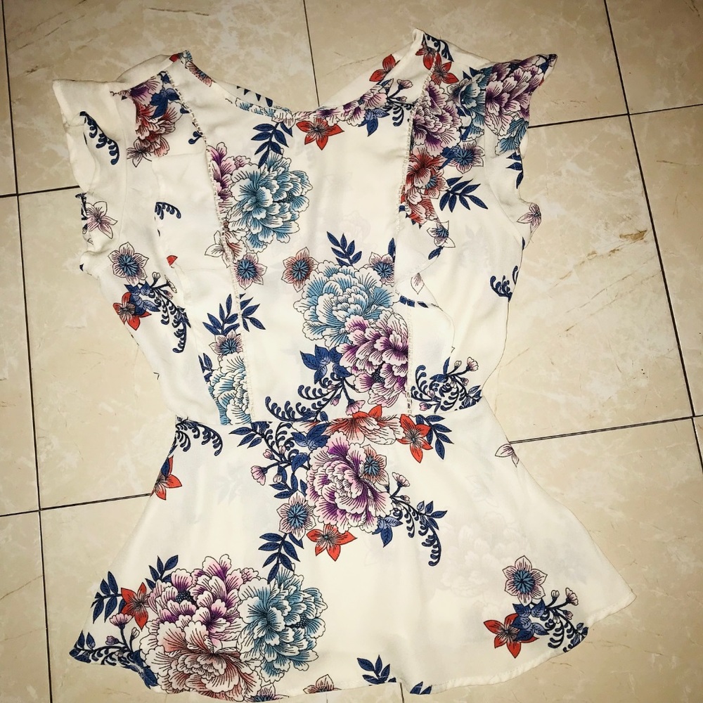 White floral sleeveless blouse